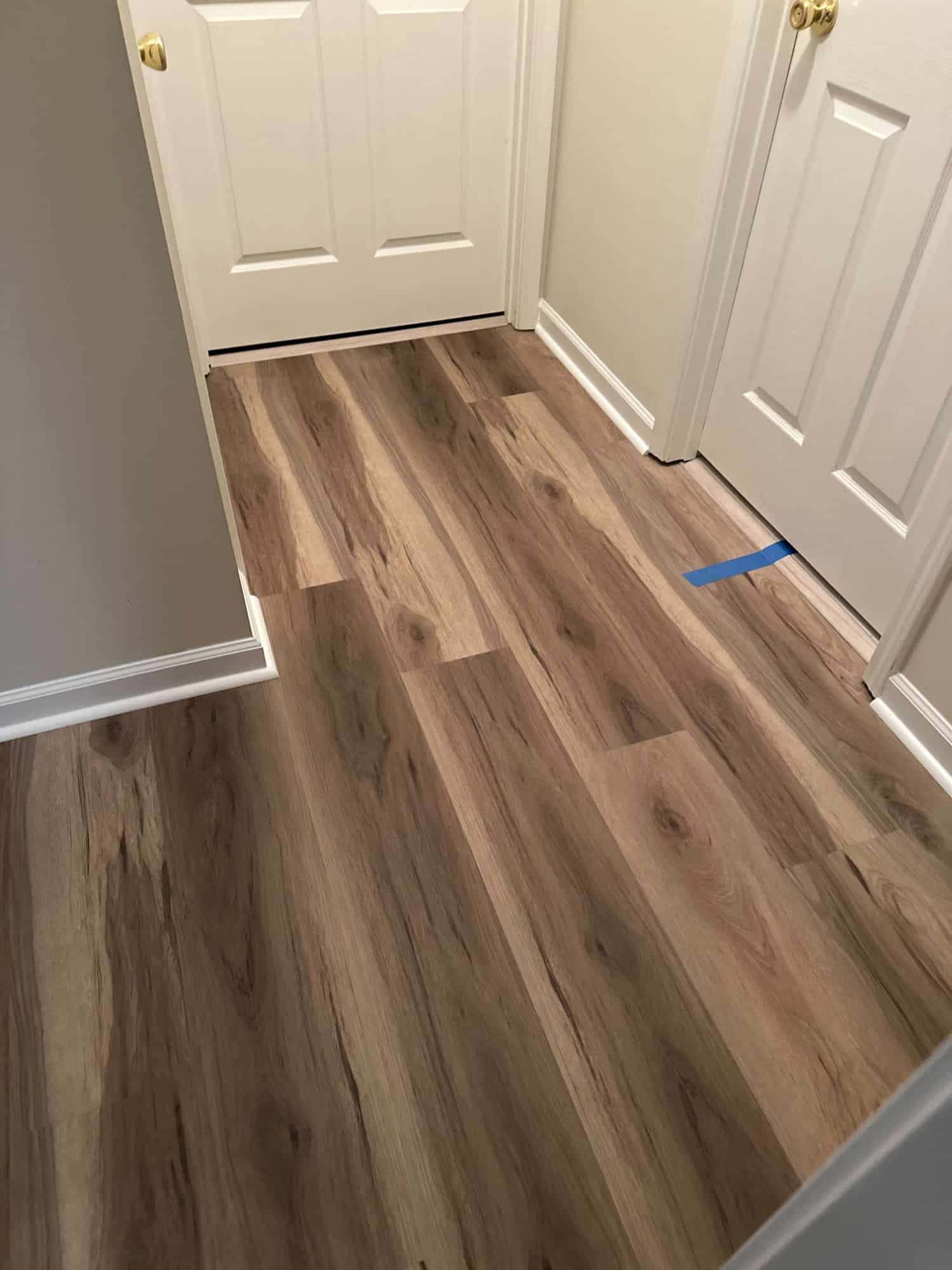 Case Floors Dockside Signature luxury vinyl plank flooring in a coastal-style hallway