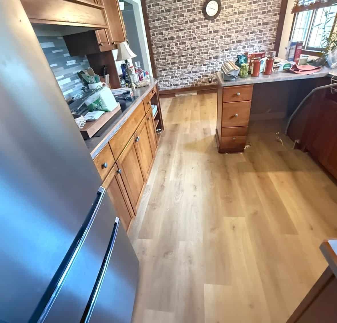 Close-up of Case Floors Honey Select waterproof luxury vinyl plank flooring in a kitchen