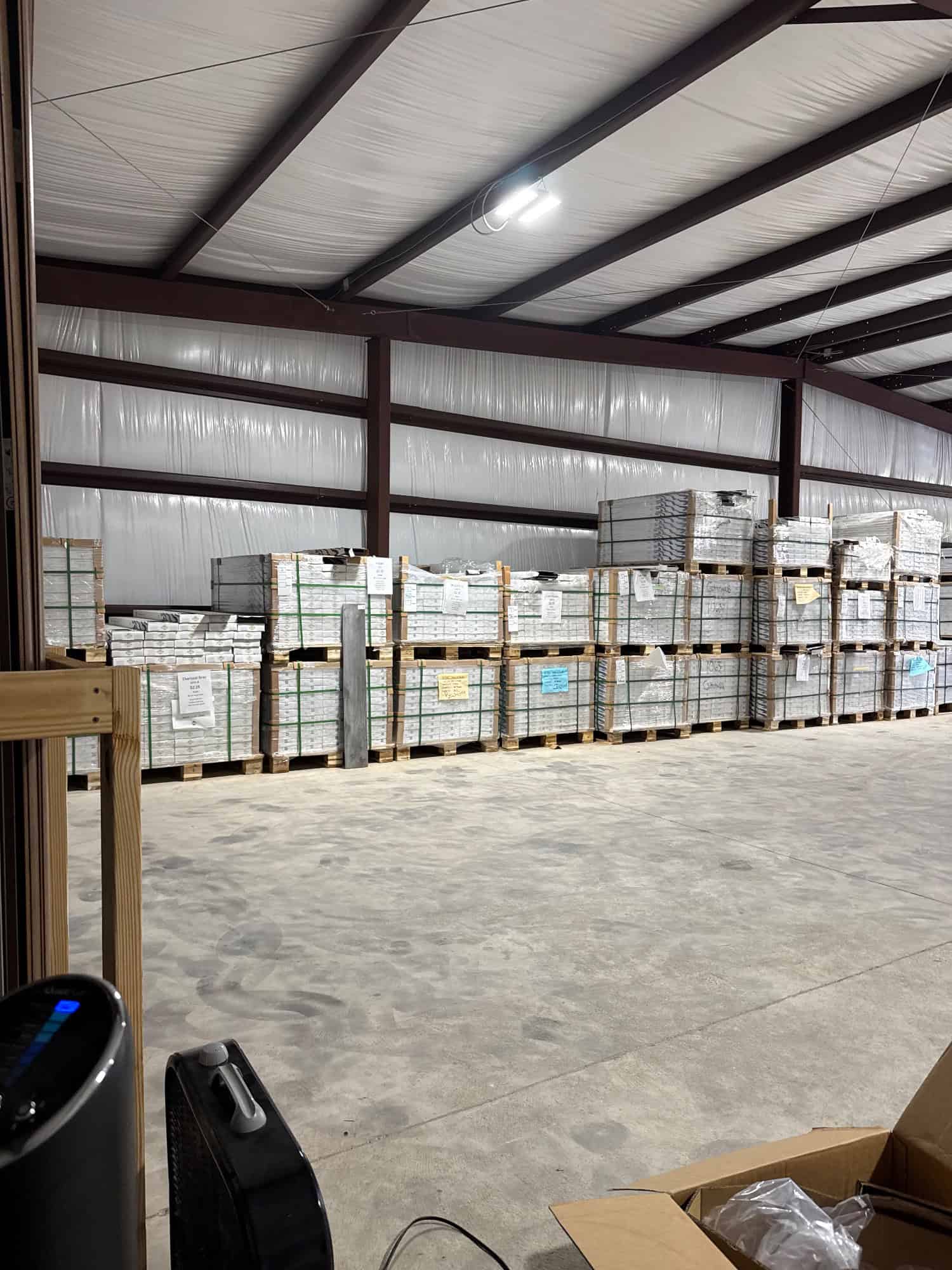 Case Floors warehouse in Pace, FL stocked with Foundation series luxury vinyl plank flooring